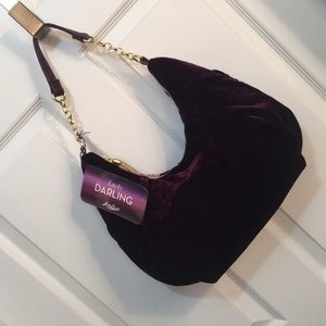 Purple velvet purse